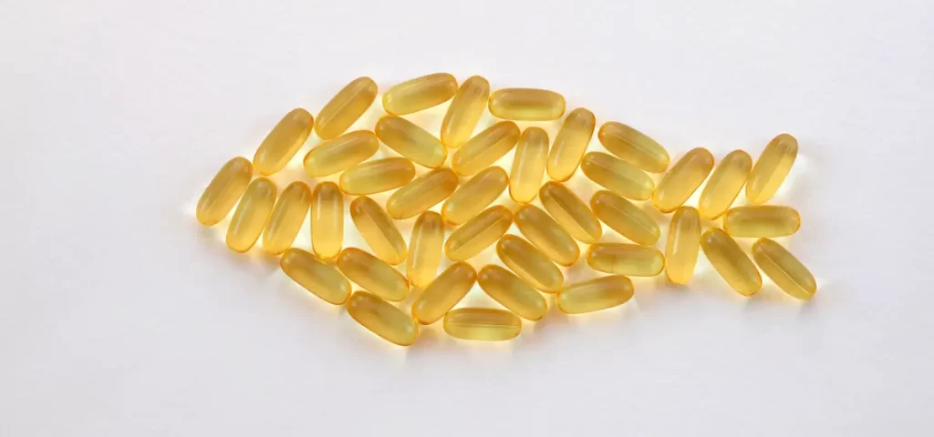 Fish oil capsules arranged in fish shape